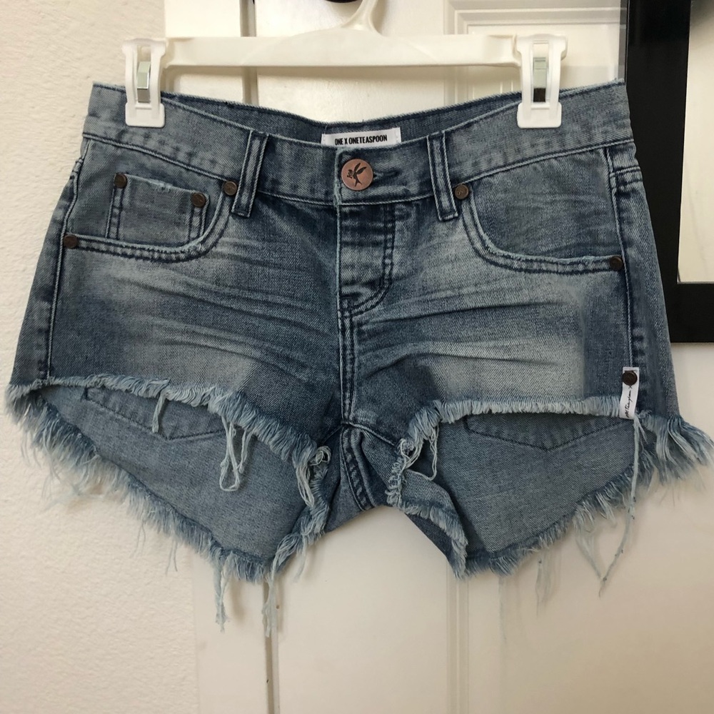 Blue distressed shorts